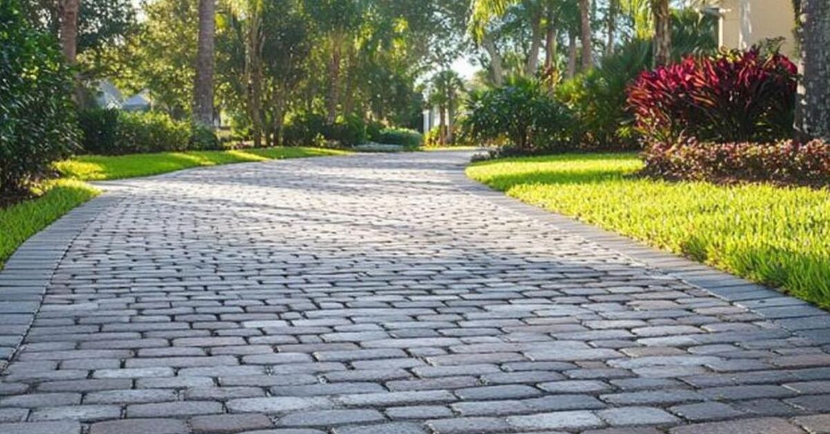 Paver walkway through landscaped grounds for a maintenance checklist
