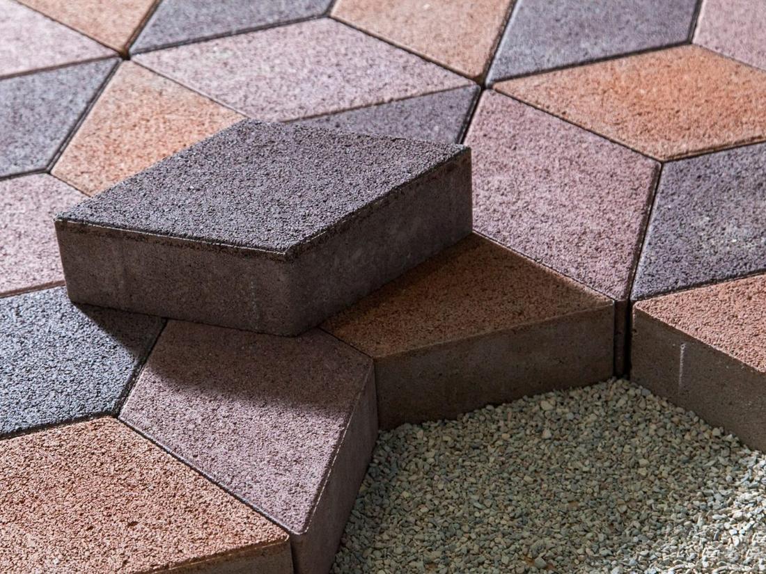 Wet-look sealer applied to a paver patio for a deep, protected finish