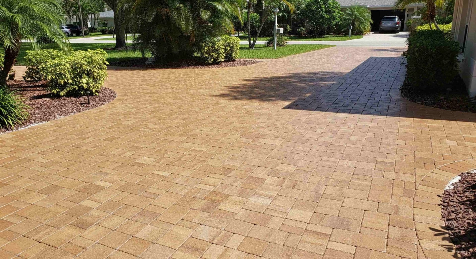 Glossy, clean pavers enhance curb appeal, highlighting the benefits of sealing pavers.